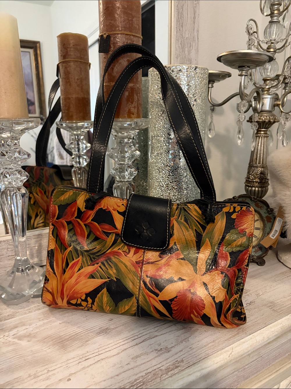 Patricia Nash Black Floral Leather Shoulder Bag with Orange Accents